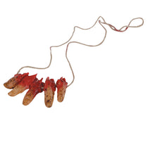 Prop, avskurna fingrar halsband