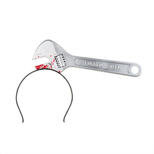 Diadem, skiftnyckel genom huvud