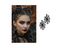 Halloweenörhängen, spindelnät