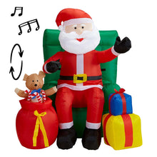 Uppblåsbar props, tomte i fotölj med julklappar 122 cm